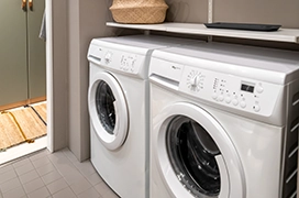 A white washer and dryer set.