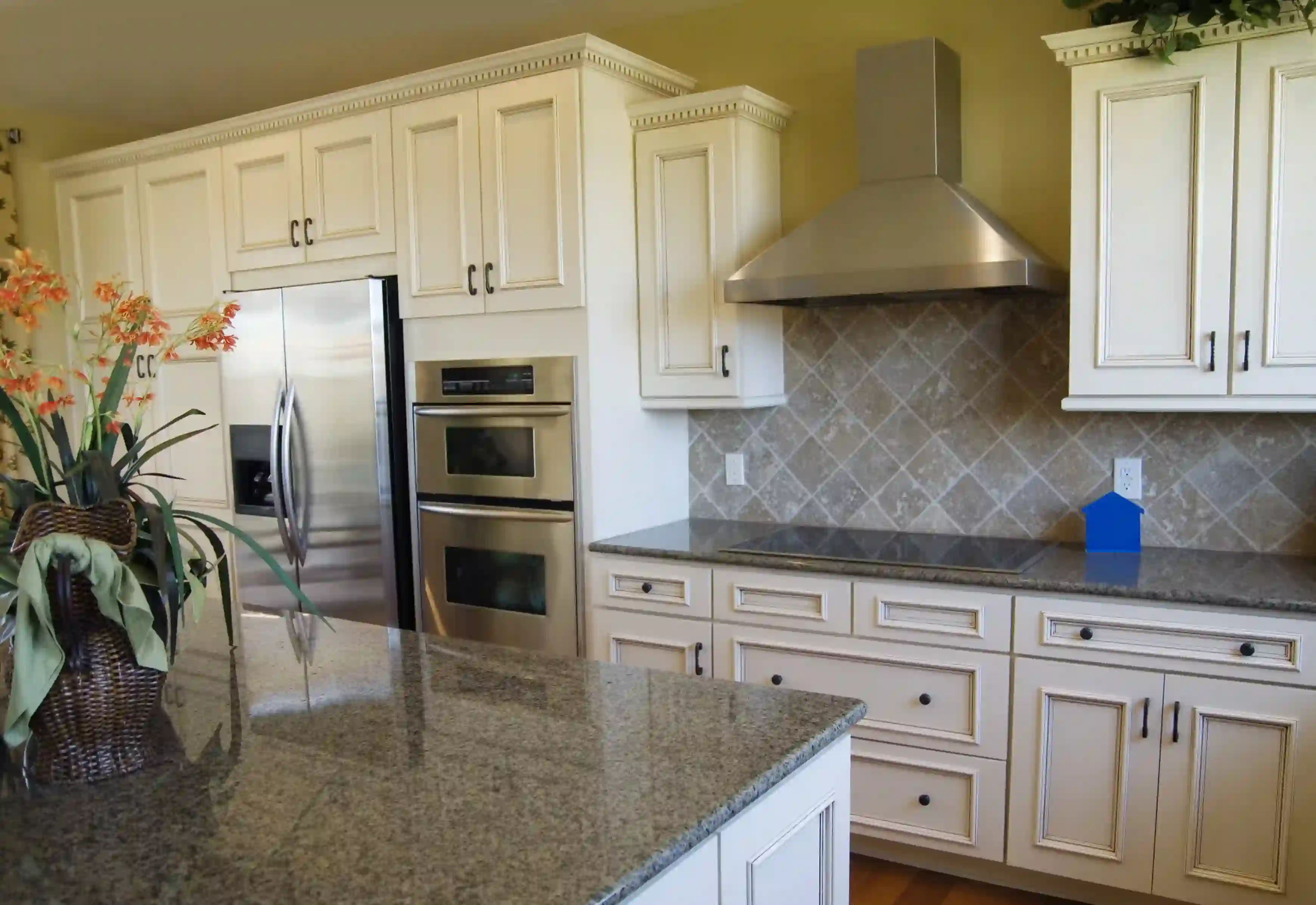 Clean kitchen with stove and range hood