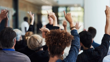 A group of people raising their hands | Mr. Appliance of Memphis