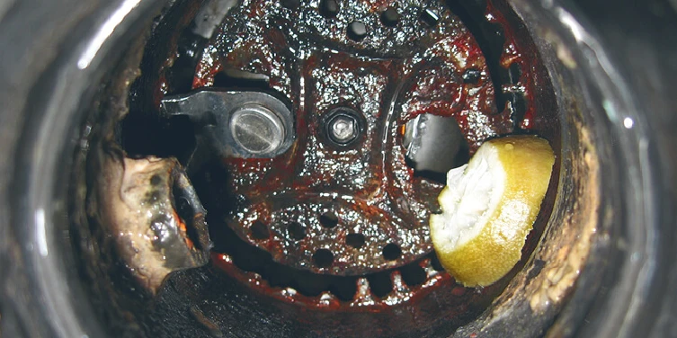 food stuck in a garbage disposal