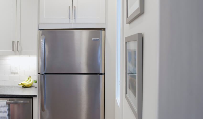 How Far Should Fridge Be from Wall: Optimal Spacing Tips