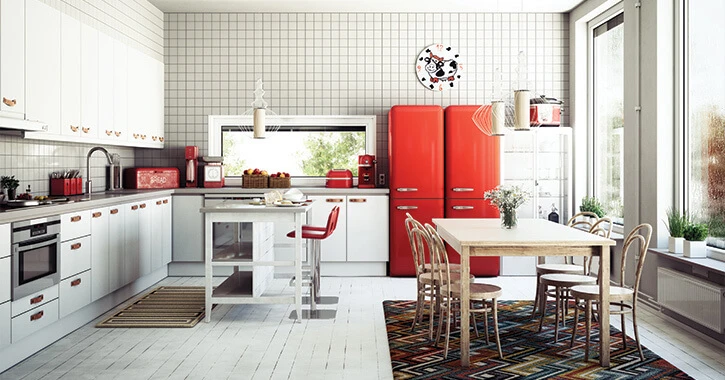 Modern kitchen with appliances, island, and table