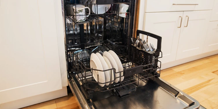 Open dishwasher filled with dishes