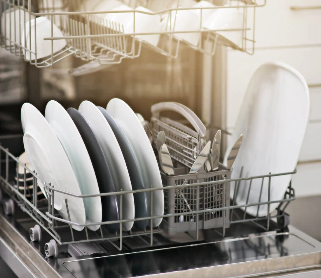 Clean dishes in dishwasher