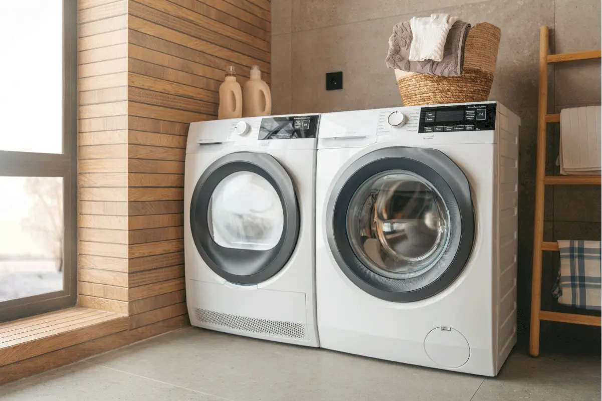 White side-by-side front-loader washer and dryer.