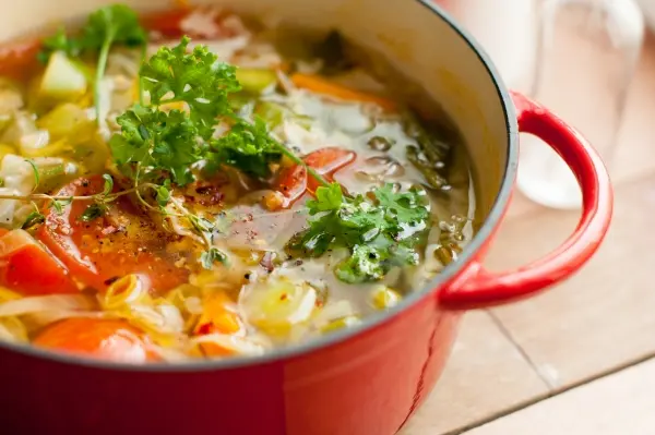 Homemade soup in a cast iron Dutch oven