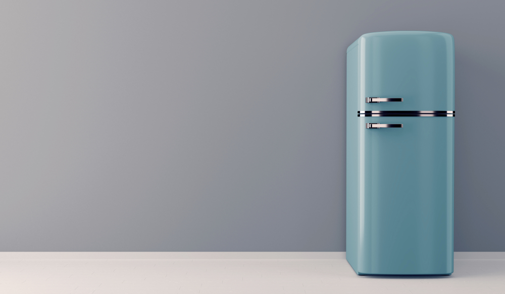 Blue refrigerator standing alone